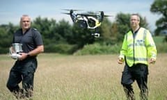 Officers from Devon & Cornwall police fly a drone.