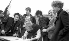 Cash from chaos: the Sex Pistols sign a record deal with A&M outside Buckingham Palace, March 1977.