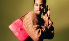 model with red leather handbag
