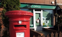 Red pillar box and village sub-post office, Warrington, Cheshire