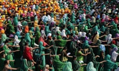 Officials and civilians take an oath for a clean Ganges on the banks of the river in Allahabad, India.