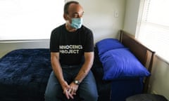 Robert DuBoise is pictured on his bed at his new home in Tampa. 