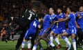 Colchester players celebrate after their penalty shootout win over Premier League Spurs in the Carabao Cup.