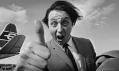 Ken Dodd arriving at London airport in 1965