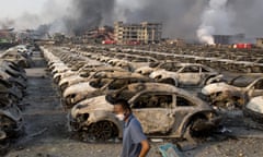 The charred remains of new cars at a warehouse in China’s north-eastern port at Tianjin.