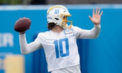 Los Angeles Chargers quarterback Justin Herbert runs a drill at a May camp in Costa Mesa, California.