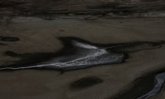 A puddle of water inside Incachaca dam, which supplies water to a main part of the city of La Paz, Bolivia on November 23, 2016. On previous weeks, a water drought has impacted the capital of Bolivia, drying out its principal dams.