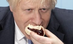 Boris Johnson eating a scone at Rodda’s creamery in Redruth, Cornwall, November 2019