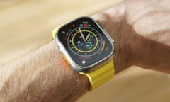 Apple Watch Ultra review pictured with the ocean band strap on a male wrist.