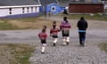 An Inuit mother and girls in traditional costume in Qeqertarsuaq, Greenland, in 2010.