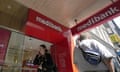 People walk past a Medibank branch in Sydney