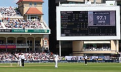 Mark Wood walks back to his mark at Trent Bridge with the big screen showing his previous delivery had beeen clocked at 97.1mph.