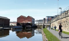 Walkers and cyclists by the Leeds and Liverpool Canal.