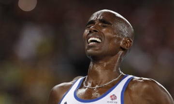 Great Britain’s Mo Farah wins the men’s 10,000m.