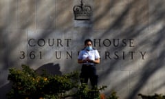 CANADA-HOMOCIDE-TRIAL<br>A security guard stands outside the Superior Court of Justice in Toronto, Ontario, Canada on November 10, 2020, during the first day of the trial for accused van attacker Alek Minassian. - A Canadian man linked to the misogynist "incel" movement and accused of killing 10 people by ploughing a van into pedestrians in Toronto pleaded "not criminally responsible" due to mental illness at the start of his trial on November 10, 2020. Alek Minassian faces 10 charges of premeditated murder and 16 of attempted murder following the attack in April 2018 that left dead eight women and two men, aged 22 to 94 years old, and others badly injured in Canada's largest city. (Photo by Cole BURSTON / AFP) (Photo by COLE BURSTON/AFP via Getty Images)