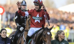 Davy Russell acknowledges the applause of the crowd after winning the Grand National on Tiger Roll.