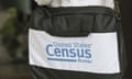 A briefcase of a census taker is seen as she knocks on the door of a residence Tuesday, Aug. 11, 2020, in Winter Park, Fla. A half-million census takers head out en mass this week to knock on the doors of households that haven’t yet responded to the 2020 census. (AP Photo/John Raoux)