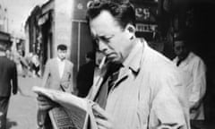 TO GO WITH STORY BY JEAN-MICHEL STOULLIG (FILES) A picture taken in 1959, shows French writer and Nobel prize laureate Albert Camus (1913-1960), reading a newspaper in Paris. French and Algerian experts have joined together to trace the steps of Albert Camus in his birthplace in Algeria, where 50 years after his death he raises both pride and political suspiscion. AFP PHOTO/- (Photo credit should read -/AFP/Getty Images)