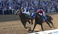 Jose Ortiz rides Aloha West, left, to victory past Flavien Prat, riding Dr. Schivel, during the Breeders' Cup Sprint race.