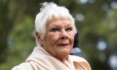 RHS Chelsea Flower Show Kicks Off After Pandemic-Related Delay<br>LONDON, ENGLAND - SEPTEMBER 20: Dame Judi Dench stands with Chelsea pensioners on the RHS Queen's Green Canopy Garden on Chelsea Flower Shows' press day on September 20, 2021 in London, England. This year's RHS Chelsea Flower Show was delayed from its usual spring dates due to the Covid-19 pandemic, which also prompted its cancellation last year. Previously, only two World Wars had caused the event's suspension. (Photo by Dan Kitwood/Getty Images,)