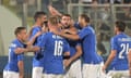 Italy's Graziano Pellè celebrates with his team-mates after scoring against Scotland