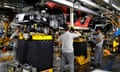 Workers on the production line at Nissan's car plant in Sunderland.