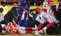 Kansas City Chiefs quarterback Patrick Mahomes takes  a late hit out of bounds by Joseph Ossai, taking his team into field-goal range