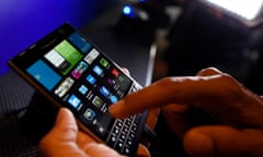 A BlackBerry Passport smartphone is shown at its official launching event in Toronto, September 24, 2014. BlackBerry launched an unconventional new smartphone dubbed the Passport on Wednesday, as it embarked on potentially the most critical phase of its long turnaround push.  REUTERS/Aaron Harris  (CANADA - Tags: BUSINESS SCIENCE TECHNOLOGY TELECOMS)