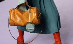 A model carries a Mulberry handbag