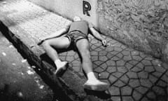 Drunken reveller outside a hamburger store in Ibiza.
[print missing!]