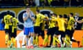 Harry Maguire looks dejected as Young Boys celebrate Jordan Siebatcheu’s last-gasp winner.