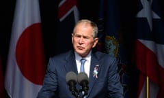 George W Bush speaking at a podium