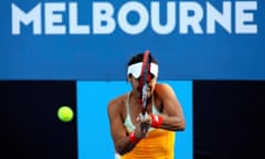 Britain's HeatherWatson hits a double backhand return to Timea Babos during their first-round match at the Australian Open.