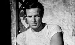 A black and white image of Marlon Brando in a cap-sleeved T-shirt.