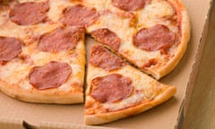 Pepperoni pizza in a takeaway box