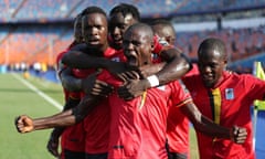 Uganda’s Patrick Kaddu celebrates scoring their first goal with teammates.