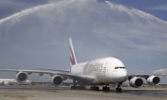 Airbus A380 starts operating in Madrid<br>epa04868642 The biggest passenger airplane in the world, the Aibus A380, is given a water jet salute by the local airport fire brigade as it arrives to Adolfo Suarez Madrid-Barajas airport in Madrid, Spain, 01 August 2015. The plane starts a new regular service between Madrid and Dubai for the Emirates Airline.  EPA/PACO CAMPOS