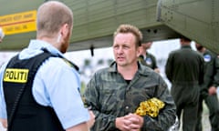 Peter Madsen speaks to Danish police after being rescued south of Copenhagen in August 2017, shortly before his submarine sank