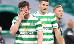 Celtic’s Anthony Ralston and Tom Rogic appear dejected after the final whistle