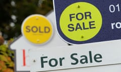 For sale signs outside a block of flats