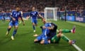 Mattia Zaccagni (centre) celebrates after scoring Italy’s equaliser in the last minute of added time
