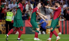 Rafael Leão, Diogo Jota and Bruno Fernandes celebrate during Portugal’s win against Luxembourg.