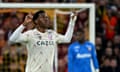 FBL-FRA-LIGUE1-LENS-LILLE<br>Lille's Canadian forward Jonathan David (L) celebrates after scoring a goal during the French L1 football match between Lens and Lille and the Bollaert-Delelis stadium in Lens on March 4, 2023. (Photo by FRANCOIS LO PRESTI / AFP) (Photo by FRANCOIS LO PRESTI/AFP via Getty Images)