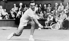 FILE - Vic Seixas of the United States backhands a volley from Denmark's Jurgen Ulrich in the first round of men's singles match at Wimbledon, England, June 27, 1967. Vic Seixas, a Wimbledon winner and tennis Hall of Famer who was the oldest living Grand Slam champion, has died at the age of 100. The International Tennis Hall of Fame announced Seixas’ death on Saturday July 6, 2024, based on confirmation from his daughter Tori. (AP Photo/File)