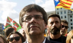 Carles Puigdemont has defied a Spanish court summons to stay in Brussels.