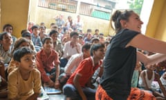 A teacher and children on the Warwick Laksh programme.