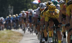 Primoz Roglic wears the yellow jersey during stage 19 of the Tour de France from Bourg-en-Bresse to Champagnole