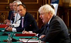 Then prime minister Boris Johnson speaks at a cabinet meeting on 15 September 2020, with Matt Hancock, then health secretary, and Liz Truss, then international trade secretary, listening.