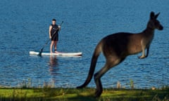 Cait Kelly stand up paddleboarding