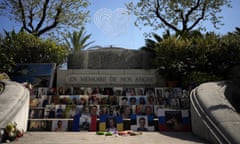 ‘En mémoire de nos anges’ (In memory of our angels): a memorial engraved with the names of the 86 who died in the Bastille Day terror attack in Nice, with photos of many of the victims propped up on the steps below